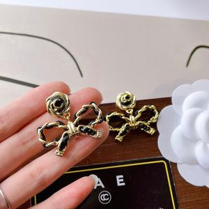 Charm designer kvalitet örhängen hög känsla design bowknot örhänge kvinnor bär örhänge populära modestil smycken utvalda älskare gåvor