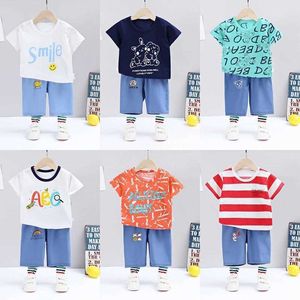 Abbigliamento Set manica corta per bambini Estate Puro cotone Ragazzi e ragazze Tshirt Oneck Pullover Tees Cartoon Animals Stampa Nuovi abiti a due pezzi