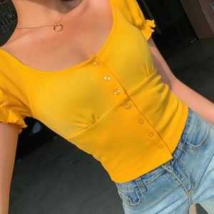 T-shirt da donna 2023 Fashion Slim Yellow Shirt Top Lady Ruffle Sleeve Button Taglio basso Casual All-match Bodycon Elegant Women Chic Crop Tops