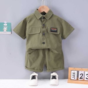 Set di abbigliamento Estate nuova lettera per bambini tuta sportiva a maniche corte per ragazzi e ragazze pantaloncini in camicia tinta unita semplice set casual in due pezzi