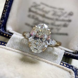 Bandringar Huitan Guldfärg Oval Cubic Zirconia Kristallring för kvinnor Enkel Elegant Bröllopstillbehör Jubileumspresent Modesmycken G230213