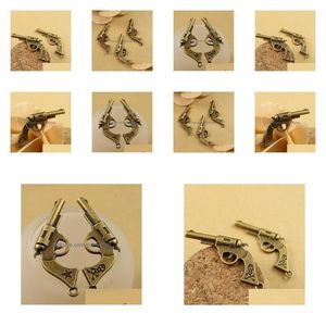 Charms 120 PCS 35x20 mm Antique mosiężne pistolet wisiorek Western Cowboy Charm pistolet revoer vintage biżuteria DHBOC