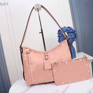 Designer Handv￤ska Luxury Women's Tote Shoulder Bag 2 Piece Leather Set Large Volume Printing Shopping Bag Accessorize med en mini pr￤glande blixtl￥s Kopplingsv￤ska