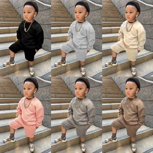 Set di abbigliamento Nuovi bambini Piccoli Ragazzi Ragazze Tuta Abbigliamento Pezzi Set di abbigliamento da casa Felpa con top in tinta unita Pantaloni da jogging elasticizzati Pantaloncini Abiti Abiti