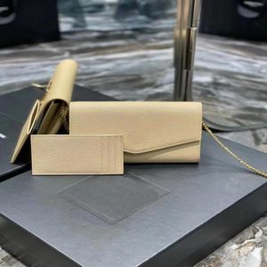 Bolsa de envelope Designer de luxo Mini bolsa de ombro bege bolsas de couro bege de pele de bege qiuaiity Uptown Chain Chain Haybrick201L