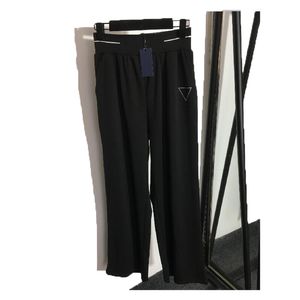 Moda feminina designer de calça de marca esportiva calça de moletom de moletom de streetwear casual primavera e outono mulheres calças calças de ioga roupas pretas rosa