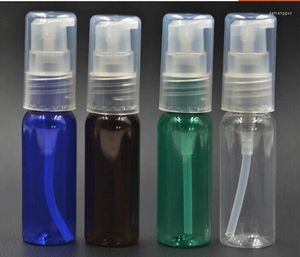 Garrafas de armazenamento 20ps/lote 20ml Pequeno loção clara de spray garrafa de viagem líquido shampoo plástico portátil com bomba e tampa