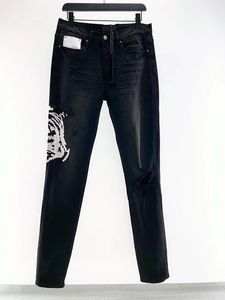 Jeans da uomo Designer Jean Hombre Pantaloni da uomo Ricamo Patchwork Strappato per tendenza Pantaloni da moto di marca da uomo Skinny 916
