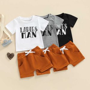 衣料品セット夏の新しい男の子パンツスーツファッションカジュアルレタープリントTSHIRTELASTIC WAIST DROWSTRINGショーツとポケット服セット