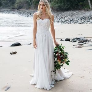 Strapless Fitted Waist A-line Wedding dresses With Soft Flowing Chiffon Skirt With Train Delicate Lace And Pearl Detailing Beach Bridal Dress
