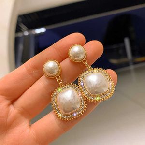 S925 ago d'argento coreano East Gate Square orecchini di perle con temperamento versatile