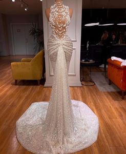 Luxury Mermaid Wedding Dresses Sleeveless High Neck Sparkly Beaded Pearls Sequins Appliques Hollow 3D Lace Bridal Gowns Plus Size Vestido de novia Custom