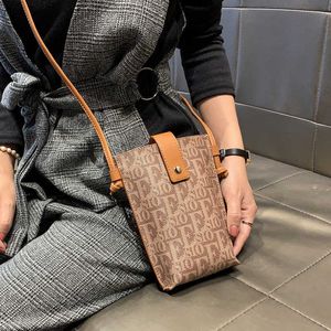 Axelväskor crossbody mobiltelefonpåse kvinnors trend liten publik design en-axel mini tunn