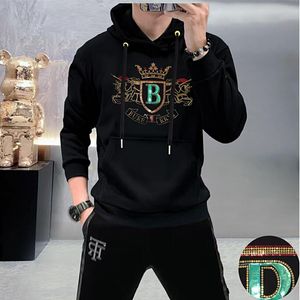 Esta￧￣o europ￩ia novo moletons masculinos da moda com capuz da moda Hot Diamond Letter Top Pullover Personalidade Camisa inferior da moda e confort￡vel