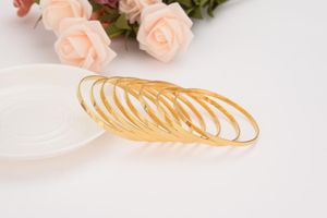 Bangle Arrival Dubai Gold Bangles Braccialetti con finitura solida 24 K Mazzo di gioielli africani / europei / etiopi lisci