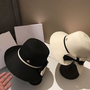 Partihandel bred grim hink hatt kvinnlig designer halm cap med kändis hopfällbar kupol bowknot bassin sunbonnet för damer ny ankomst