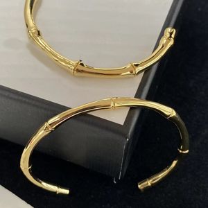 18k gold-plated bamboo couple cuff bracelet, which means that love is stronger than gold, rising steadily like bamboo. Stylish, beautiful, wedding party designer jewelry
