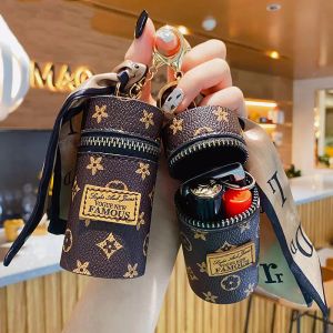 Designer Keychain Luxury Leather Bucket Lipstick Bag Silk Scarf Keychain Exquisite Personalized Storage Bag Pendant Women Accessor2537