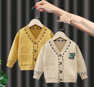 M Kids Designer Complement Soldigan Cardigan Baby Boy Girl Subsiters Pocket Soft stenwear Jumper Coat Coat B104