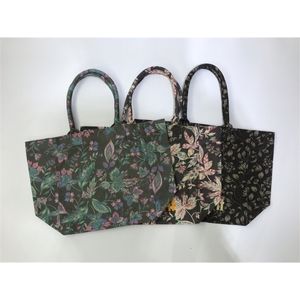 Shoppingväskor blommor bokstäver tryck väska kvinnors handväskor largecpacity enkel mode kvinnlig duk 230216