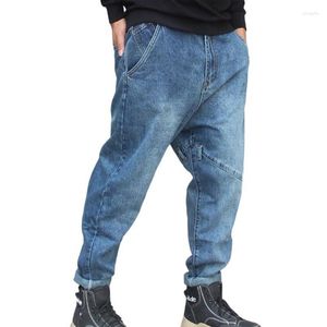 Jeans masculinos cruzam calças Big Pocket Four Seasons Hip-Hop Men tamanhos soltos harém de harém cônico Pés