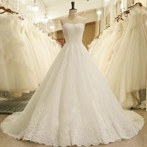 2023 Abiti da ballo ricamati con perline di lusso Abiti da sposa Abito da principessa Corsetto Sweetheart Organza Ruffles Cattedrale di strascico Abito da sposa in pizzo Taglie forti Custom Made