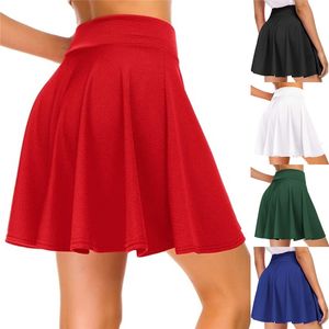 Kjolar kvinnors grundläggande kjol mångsidig stretchig blossad casual mini skater kjol röd svart grön blå kort kjol 230217