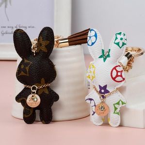 Designer Key Rings Rabbit PU Leather Keychains Purse Pendant Car Keyring Chain Charm Brown Flower Mini Bag Tassel Gift for Men