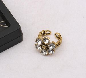 Bands de lettres de marque en or 18 carats pour hommes créateurs de mode pour femmes Open Turquoise Crystal Metal Daisy Ring Jewelry One Size