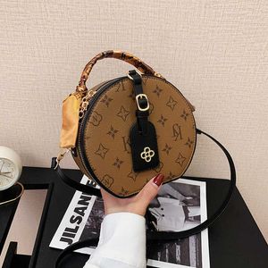 이브닝 가방 New One Sling Shoulder Crossbody 여자 패션 편지 작은 네티즌 성격 라운드 케이크 가방