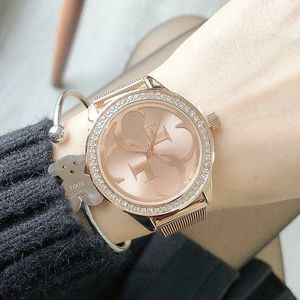 Kvinnors klockor Titta på Fire Men's Sports Watch Luxury Diamond Inlaid Women's Watch Bangle Watch