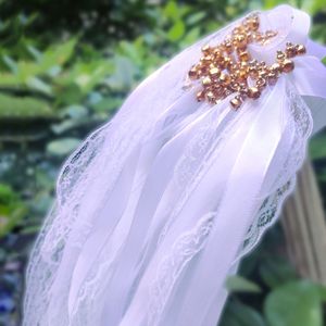 Banner Flags 50Pcs White Lace Ribbon Wedding Wands with Gold Bell 20pcs Wedding Ribbon Fairy Stick Twirling Streamers Party Prop Wands 230217