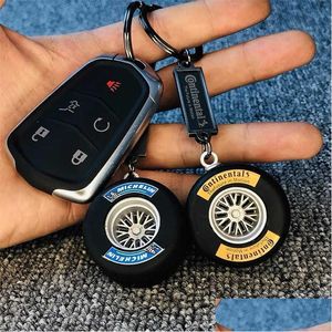 Araba DVR Araba Anahtarı 2021 Yeni Cazibe Çıkarılabilir Hub Keychain Luxury Uni Mini Yarış Tekerlek Lastiği Damla Teslim Teslim Motosikletler İç AC DH0RE