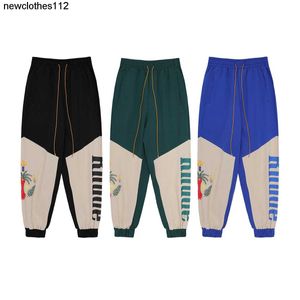 new American fashion brand rhude coconut tree dove printed splicing work clothes casual pants boys girls