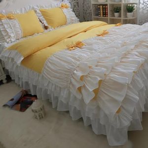 寝具セット黄色と白の弓コットンラグジュアリープリンセス4PCSケーキフリルベッドスカートデュベットカバーピローケースウェディング