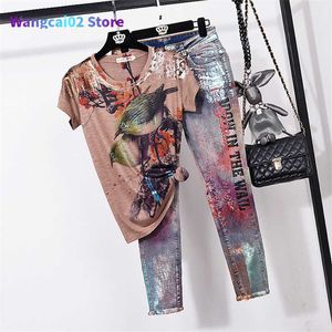 Kadınların Trailtsuits Yaz Vintage Baskı Tshirt Kalem Denim Pantolon 2 Parça Set Kadınlar Gevşek Kısa Kollu Tişört Kotu Takım Kadın Moda Sokak Giyim 022023H