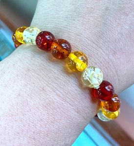Strand Certificate 12mm Natural Multicolor Mexico Amber Beeswax Armband