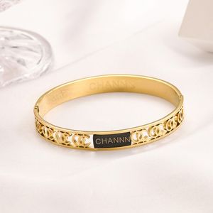 braccialetti da uomo in oro massiccio braccialetto d'amore da donna in pelle diamante lusso doppie lettere braccialetti anulus carti designer di gioielli medvedev tennis charm bangle bracciale