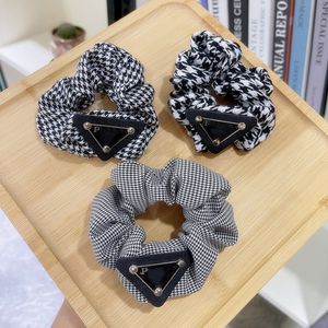 Fasce per capelli di design dolce Porta code di cavallo Marca da donna Nero Bianco Reticolo Bowknot Fascia per capelli Donne eleganti Bordo largo Cerchio per capelli di alta qualità Accessori per la testa larga