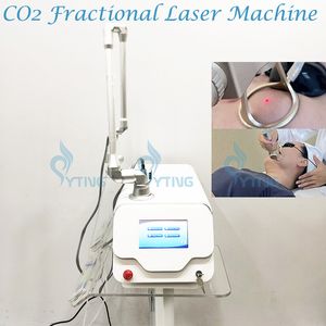 Macchina laser CO2 frazionata Cura del viso Ringiovanimento della pelle Rimozione della cicatrice dell'acne Trattamento delle smagliature Attrezzatura di serraggio vaginale