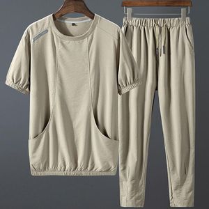 Tute da uomo Tute casual da uomo Taglie forti Tute da jogging attive Tute estive con tasche grandi T-shirt corta da 2 pezzi Pantaloncini da uomo