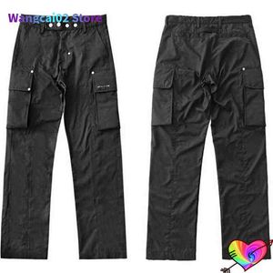 Calças masculinas preto 1017 Alyx 9SM Cargo Pants Men Mulheres Multi Metal Button Alyx Bolsets