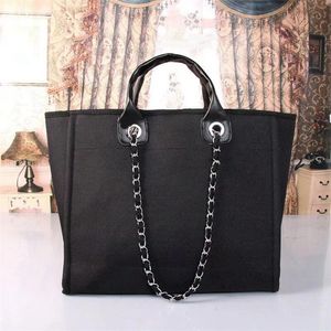 Ciao vendita Nuove borse a tracolla da donna di design di lusso di alta qualità borsa di tela in pelle famose borse con coulisse Borsa a tracolla nera Borse da spiaggia