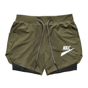 Män shorts män gym casual sport andas anda strand andas shorts fitness snabbtork basket löst shorts märke logotyptryck