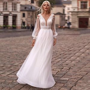 Bröllopsklänning lykta långärmad klänningar a-line v-hals spetsapplikationer knapp tyll bohemisk strand brud klänning golvlängd 2023