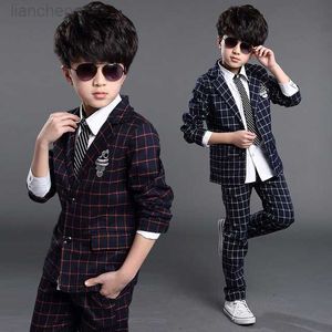 Completi di abbigliamento Elegant New Boys Abiti formali per matrimoni Marca England Style 6-14T Uomo Bambino Plaid Smoking da festa formale Ragazzi Abiti formali W0222