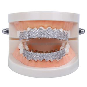 Grillz dentystyczne grille biodra biżuteria biżuteria męska diamentowe zęby Grillz Osobowość Uraskowie złota mrożona moda raper men akcesoria324a dhgwp