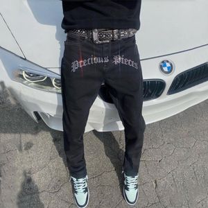 Jeans da uomo Uomo elastico nero skinny slim fit trapano punk streetwear pantaloni da motociclista uomo buco lettera denim pantaloni a matita 230222