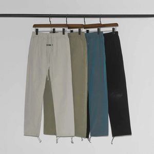 Men's and Women's Pants 2022 Fashion High Street Brand Ess Far Double Line 3m Reflective Nylon Usw9