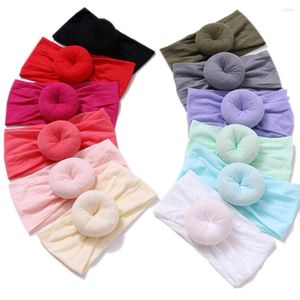 Hårtillbehör 12st/Lot Nylon baby pannband runda bulle band munkar flickor mjuk turban för spädbarn 12 färger jfny032b